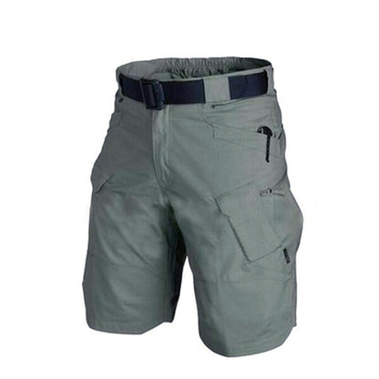 Short de sport, à hauteur des genoux. Très solide, ce short peut être utilisé pour la randonée ou les activités physique intenses.  Coton  Coupe regular kaki bleu vert